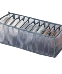 Clothes organiser with multiple compartments for neatly storing underwear, socks, bras, and scarves in drawers.