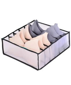 Clothes organiser with multiple compartments for neatly storing underwear, socks, bras, and scarves in drawers.