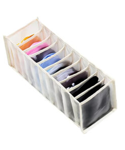 Clothes organiser with multiple compartments for neatly storing underwear, socks, bras, and scarves in drawers.